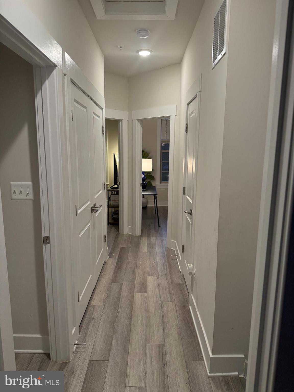 2932 Osprey Way North Frederick, MD 21701 - Photo 21 of 42 a view of a hallway with wooden floor