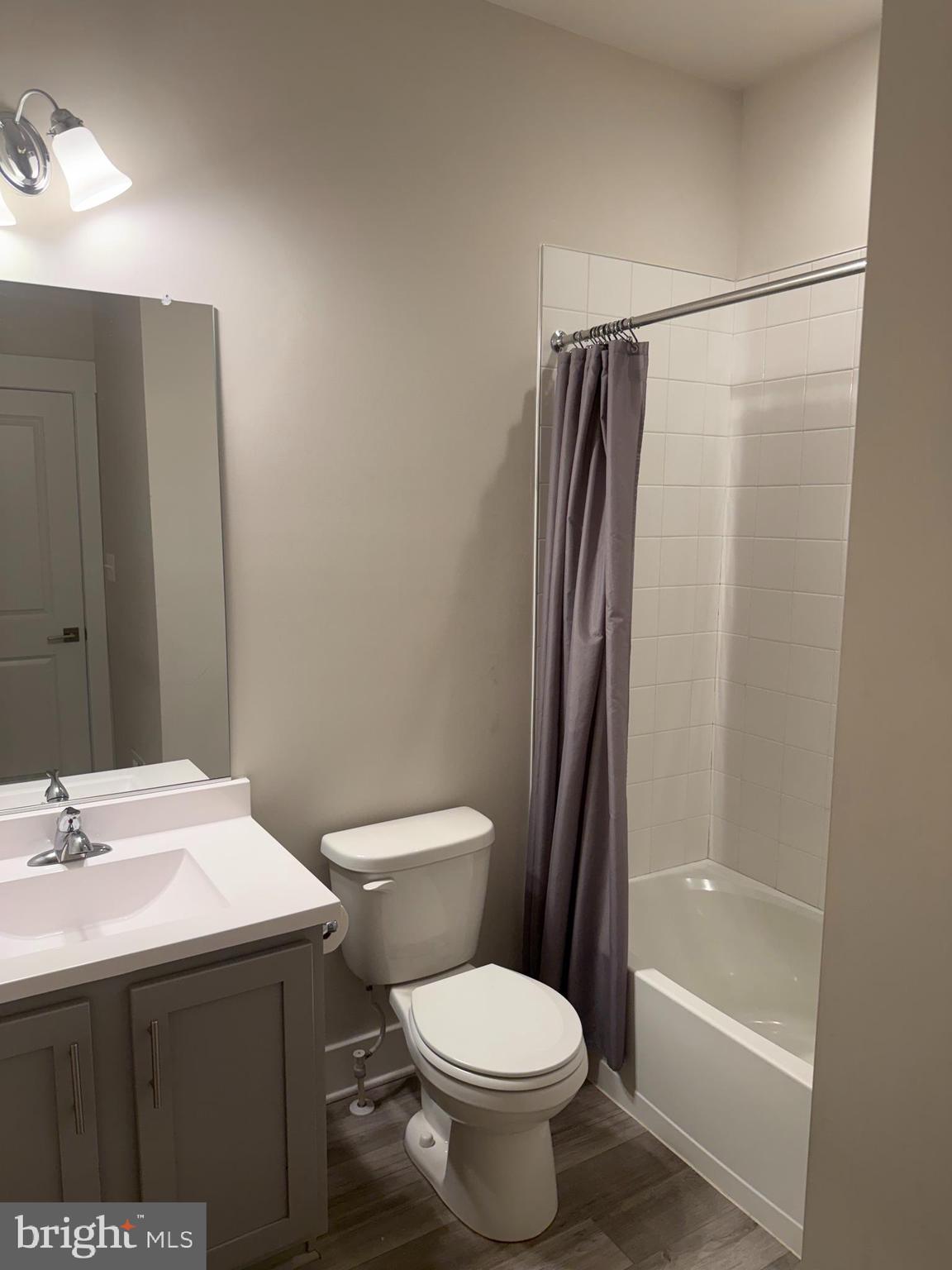 2932 Osprey Way North Frederick, MD 21701 - Photo 22 of 42 a bathroom with a sink a toilet and shower