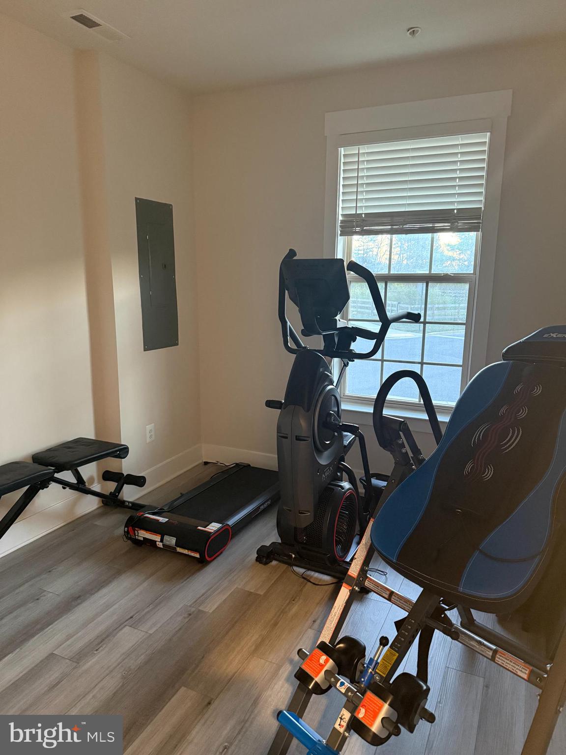 2932 Osprey Way North Frederick, MD 21701 - Photo 24 of 42 a room with gym equipment and a window
