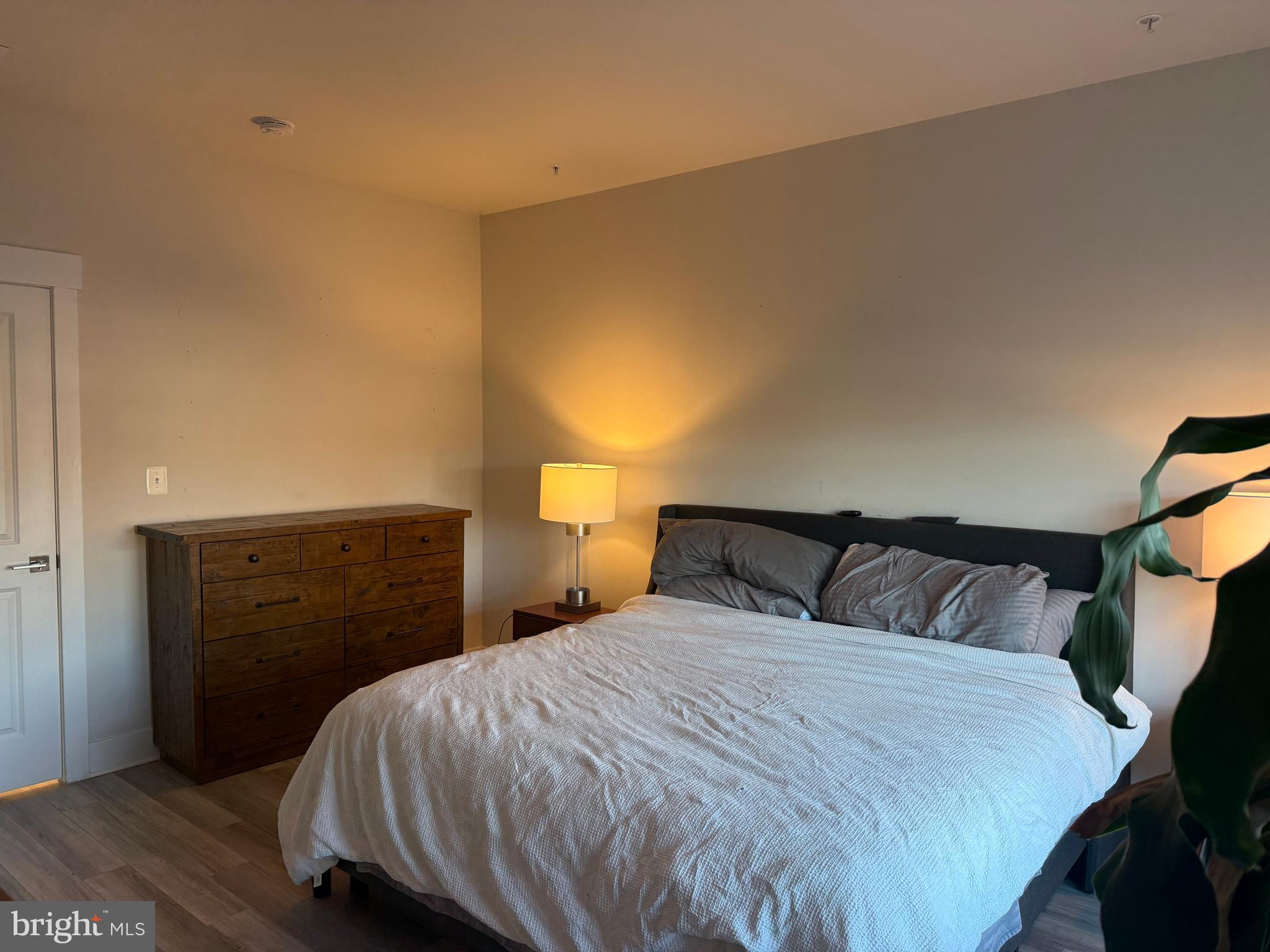 2932 Osprey Way North Frederick, MD 21701 - Photo 32 of 42 a bedroom with a bed and a dresser