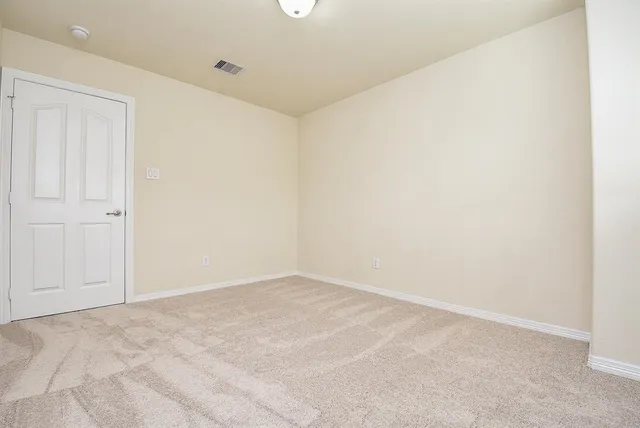 an empty room with an entryway
