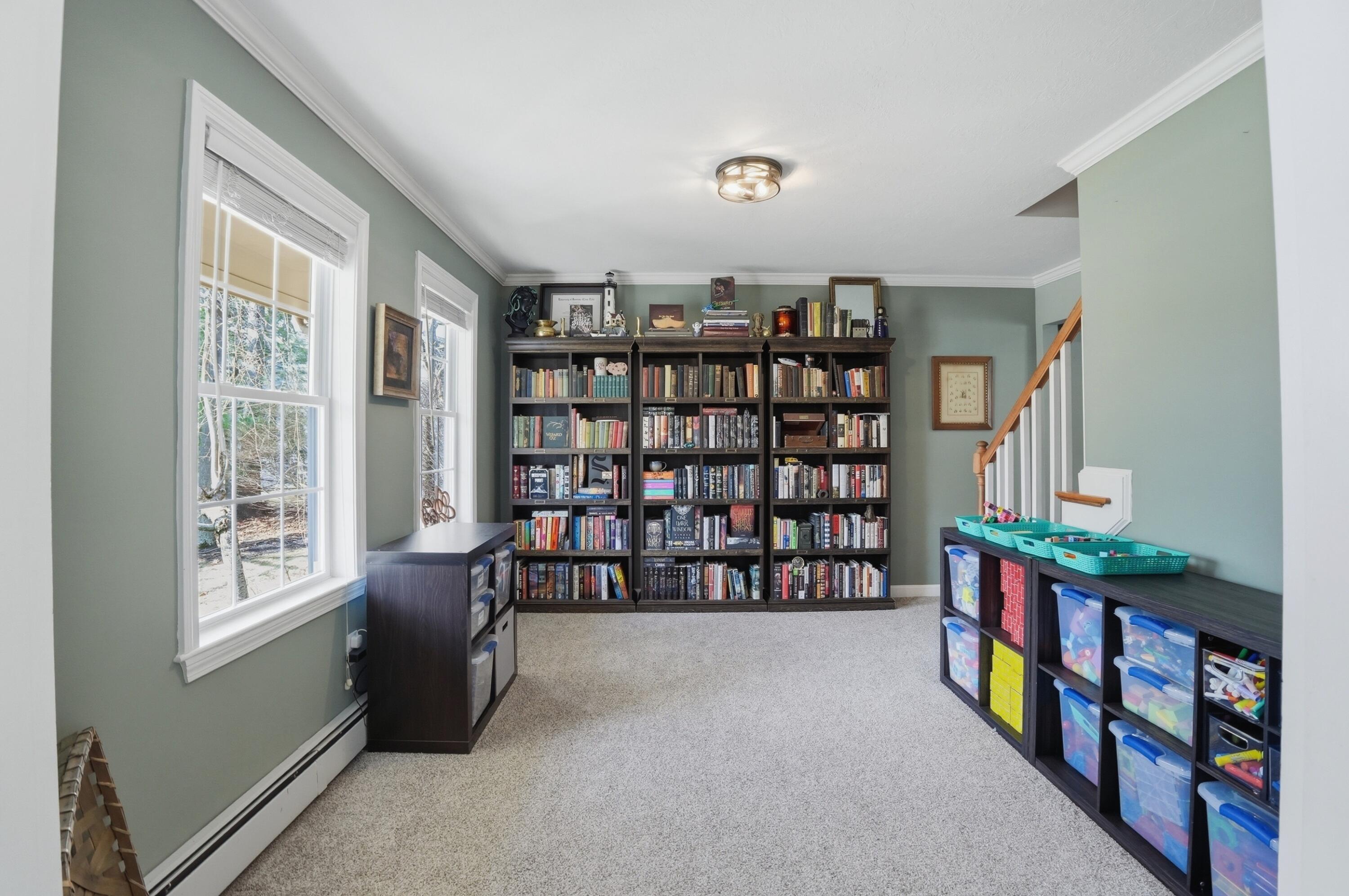 3 Dover Lane Buzzards Bay, MA 02532 - Photo 16 of 51 a room with toys and a book shelf