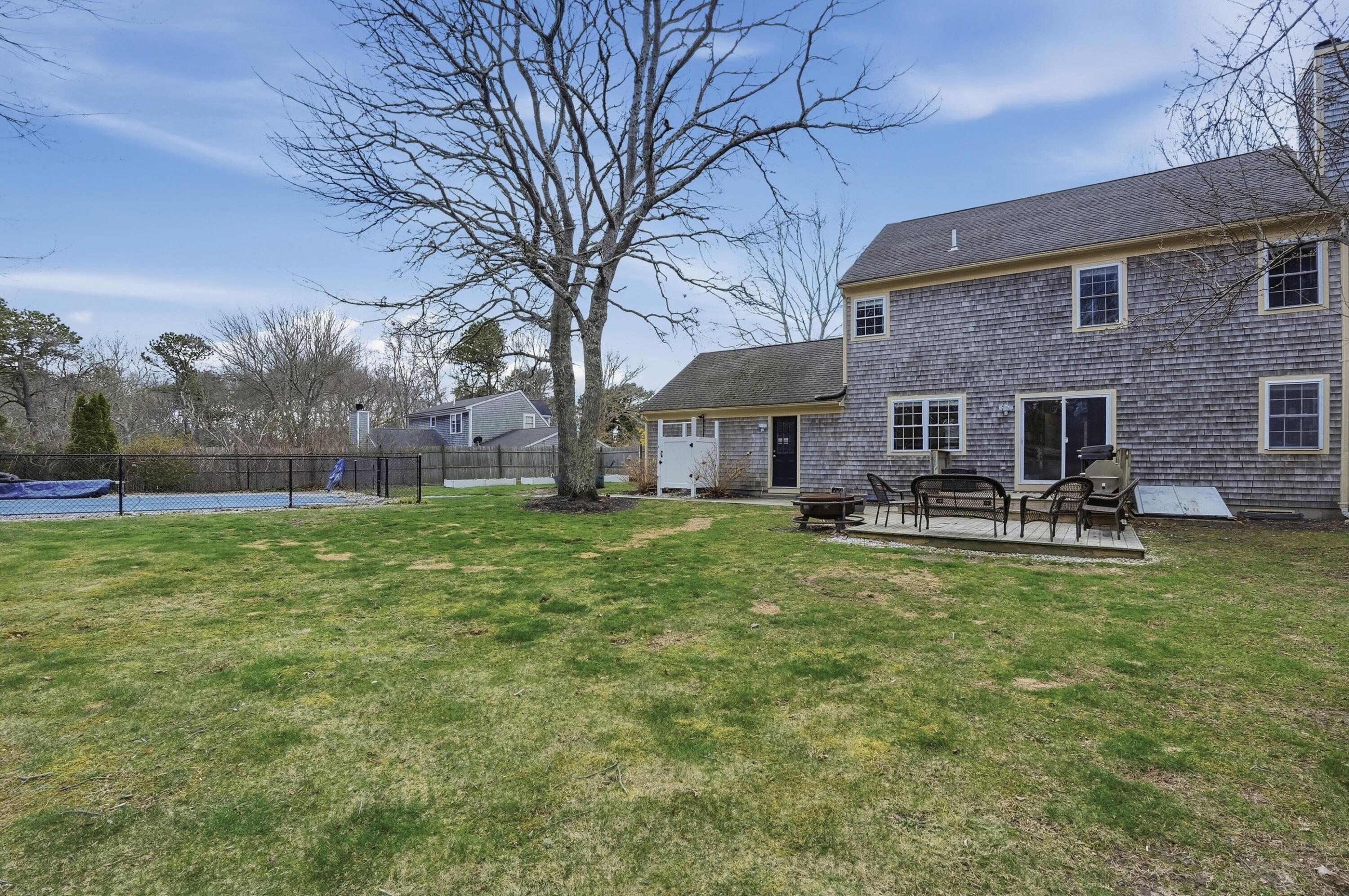 3 Dover Lane Buzzards Bay, MA 02532 - Photo 37 of 51 a house view with swimming pool and garden space