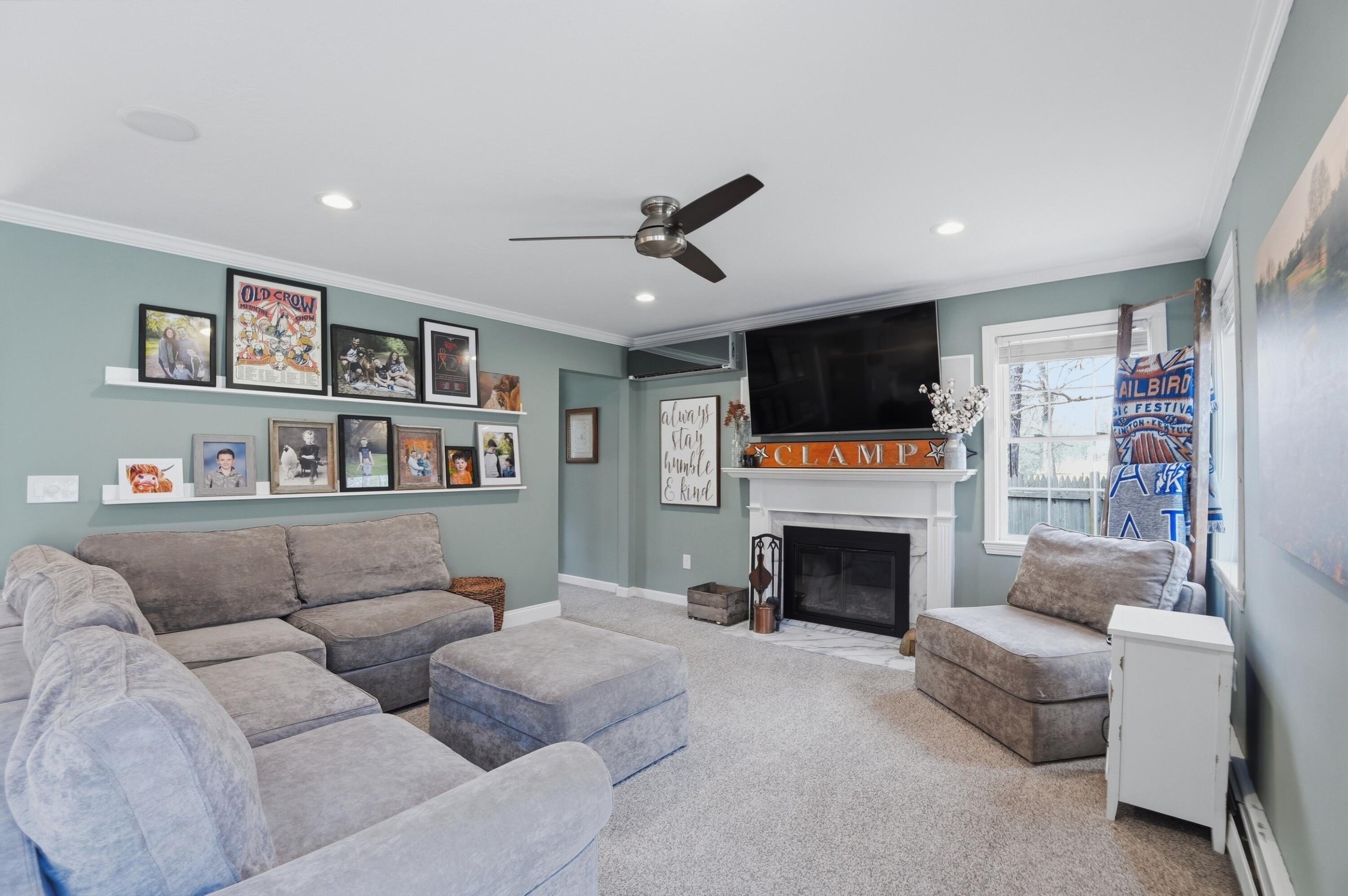 3 Dover Lane Buzzards Bay, MA 02532 - Photo 10 of 51 a living room with furniture and a fireplace