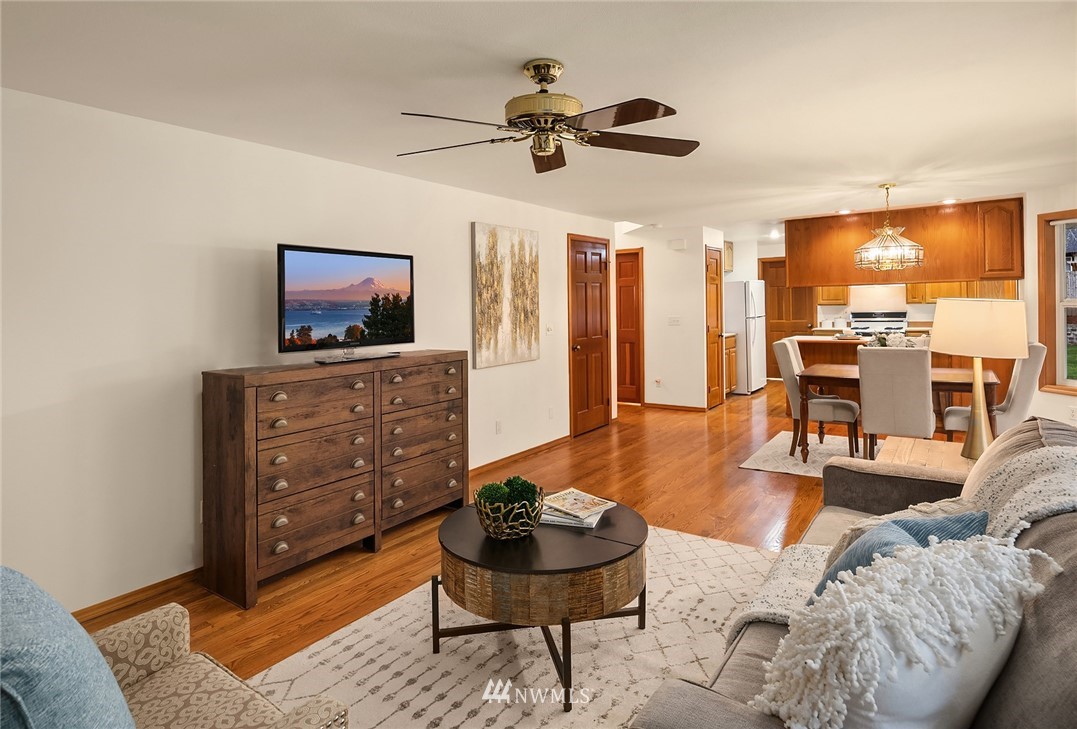 14010 282nd Lane Northeast Duvall, WA 98019 - Photo 14 of 31 a living room with furniture and a flat screen tv