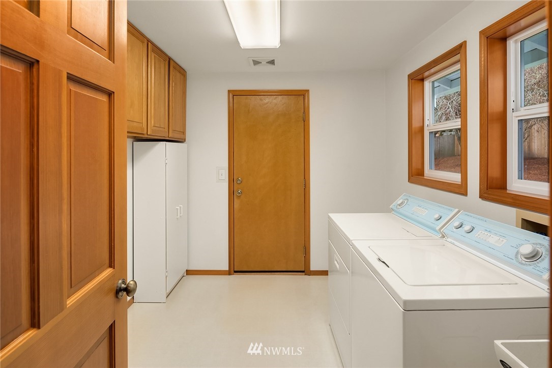 14010 282nd Lane Northeast Duvall, WA 98019 - Photo 21 of 31 a utility room with dryer and washer
