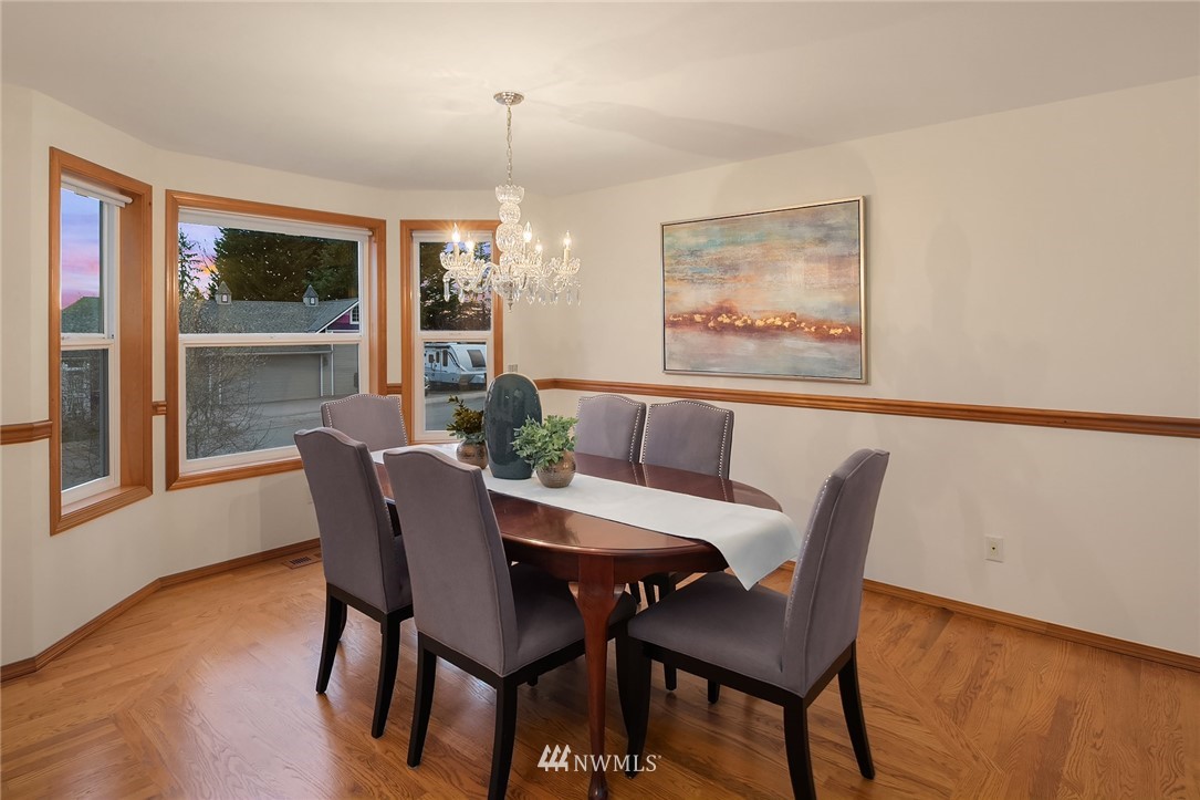 14010 282nd Lane Northeast Duvall, WA 98019 - Photo 5 of 31 a view of a dining room with furniture and window
