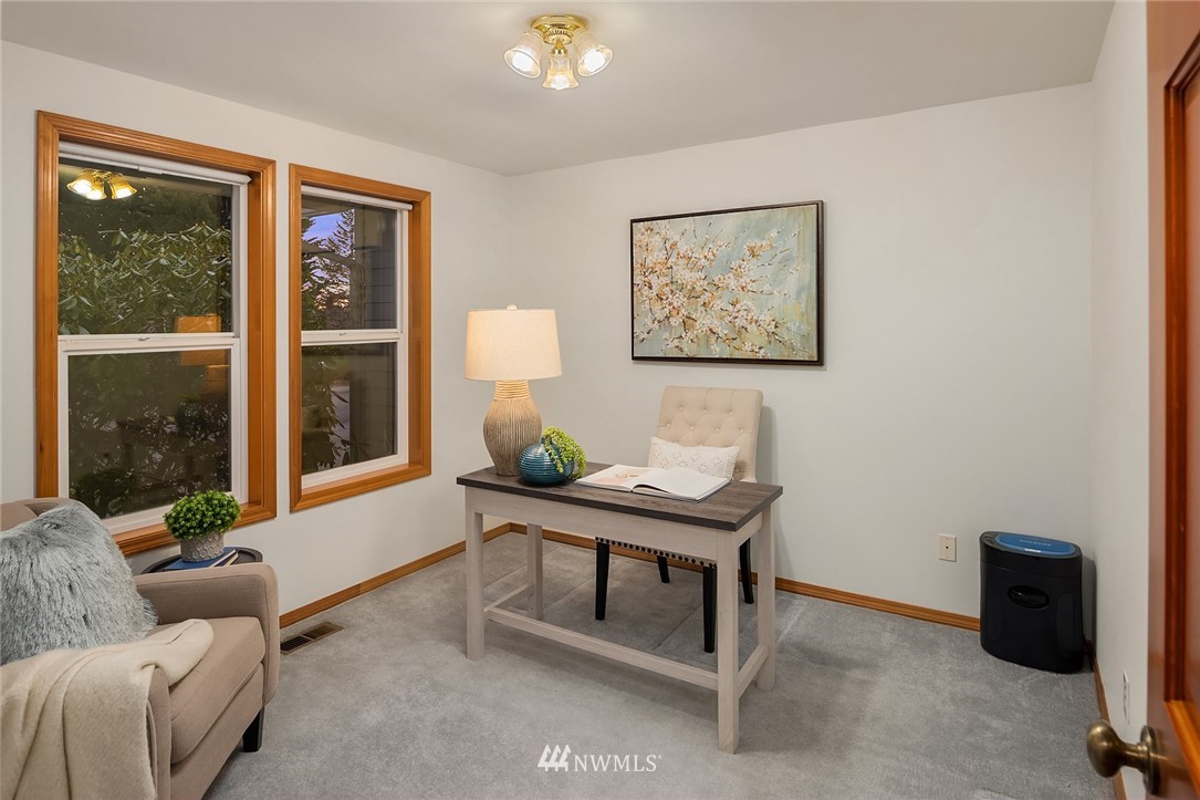 14010 282nd Lane Northeast Duvall, WA 98019 - Photo 7 of 31 a living room with furniture and a window