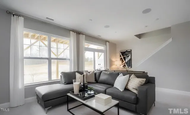 a bathroom with a double vanity sink mirror and shower