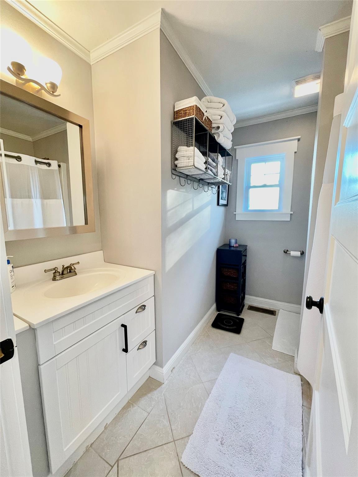 60 Little Point Lane Ridgeway, SC 29130 - Photo 20 of 48 a bathroom with a sink a toilet and a mirror