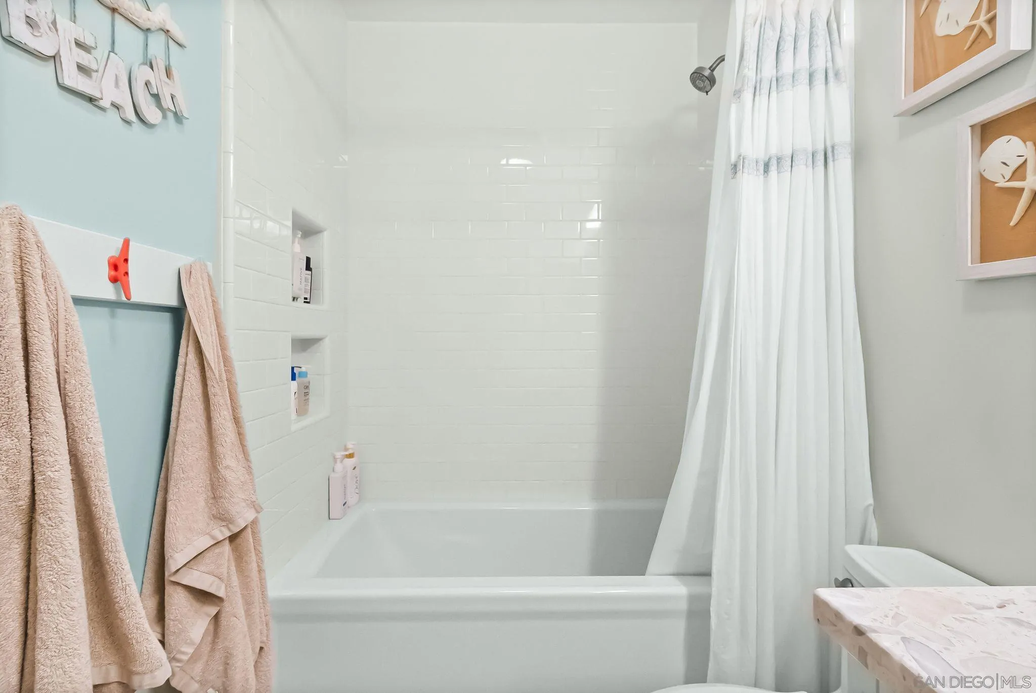 13814 Recuerdo Drive Del Mar, CA 92014 - Photo 15 of 31 a bathroom with a shower curtain and a sink