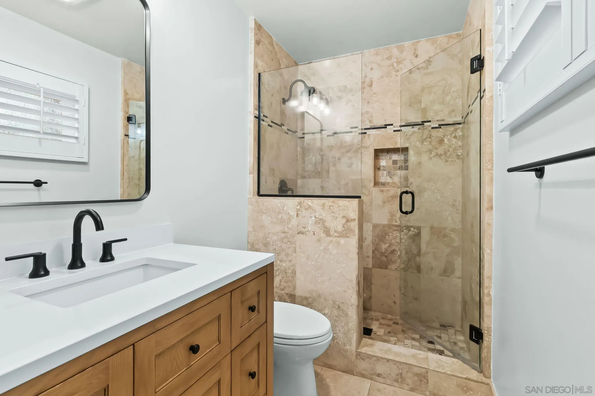 13814 Recuerdo Drive Del Mar, CA 92014 - Photo 21 of 31 a bathroom with a sink toilet and shower