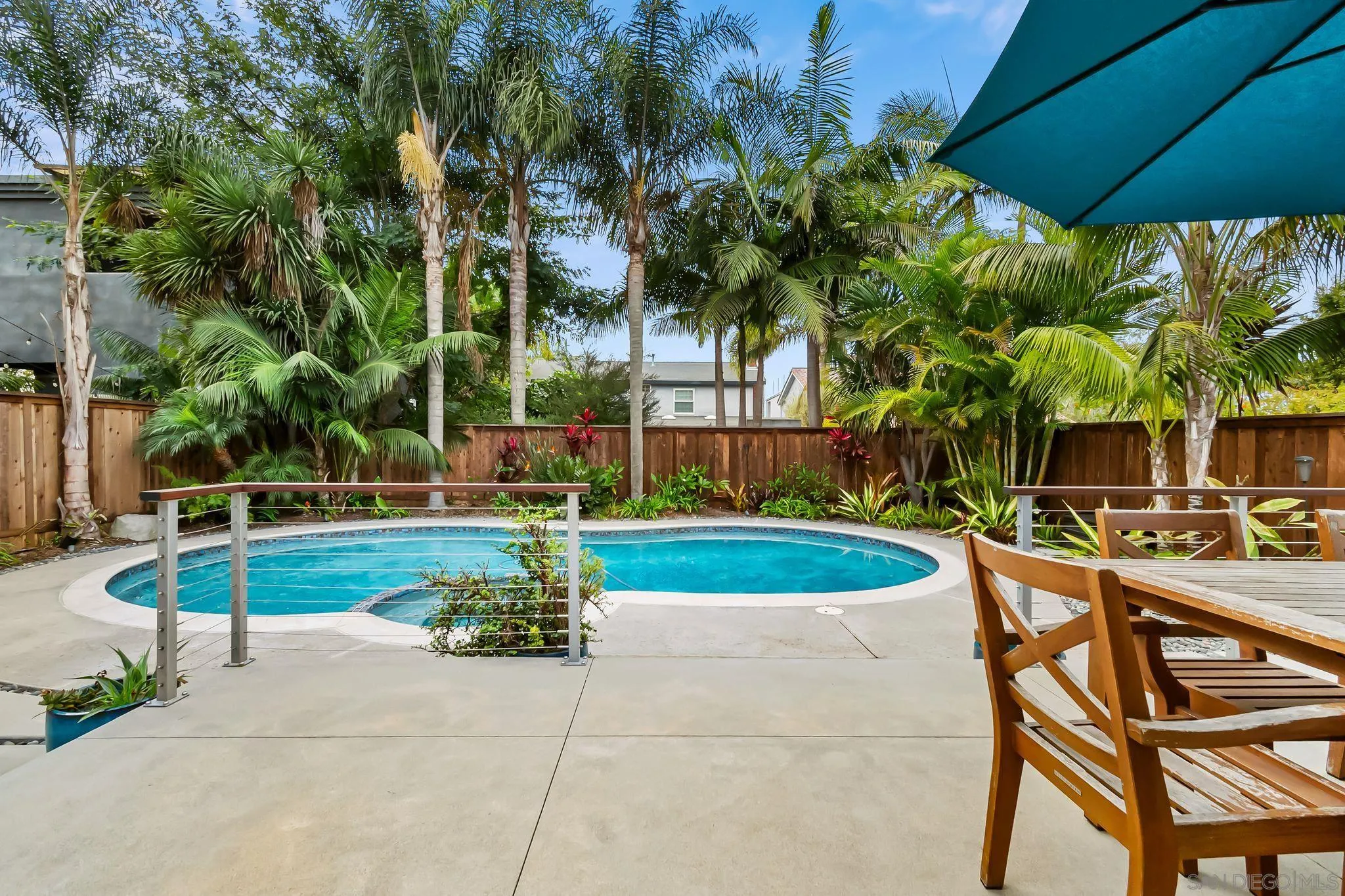 13814 Recuerdo Drive Del Mar, CA 92014 - Photo 27 of 31 a view of backyard with swimming pool and outdoor seating