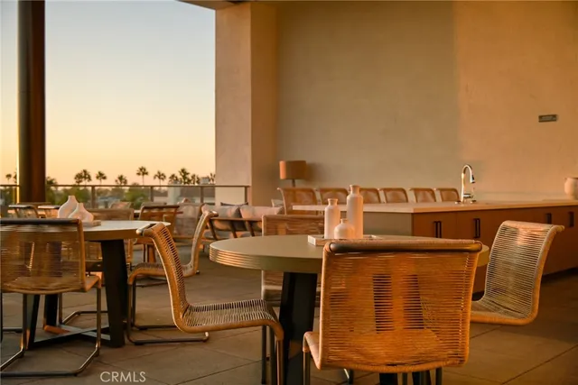 a view of a balcony with chairs