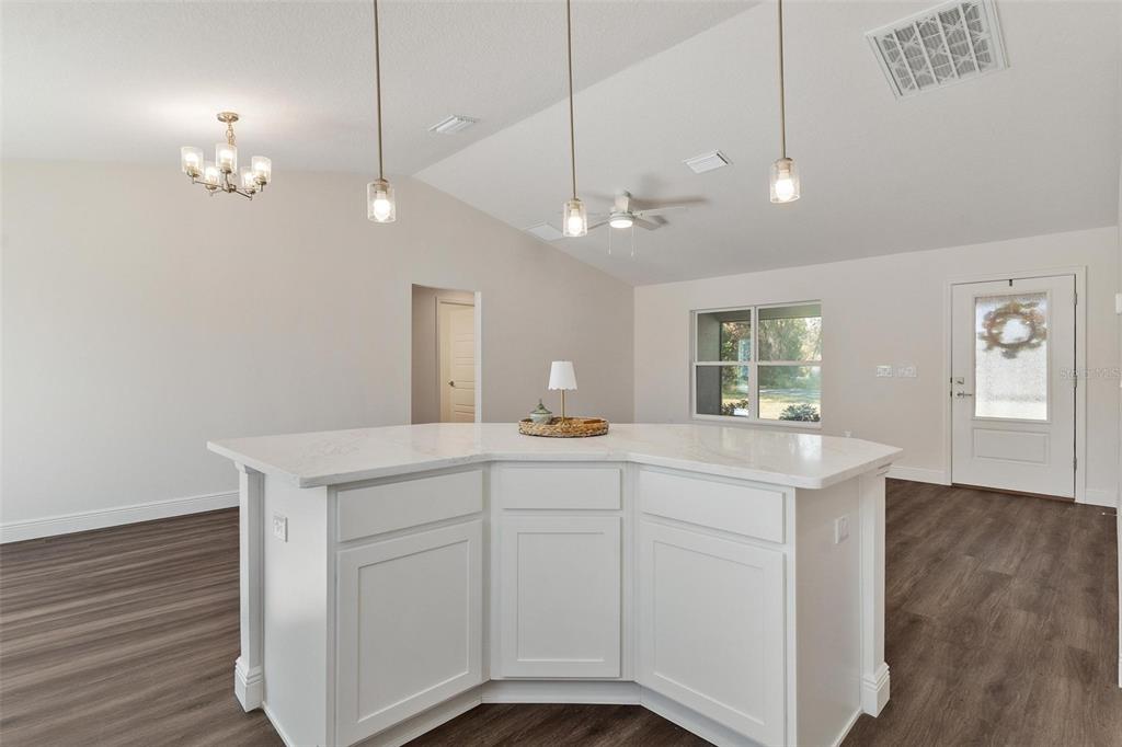 2011 Edgewood Avenue Leesburg, FL 34748 - Photo 18 of 44 a room with a sink and chandelier