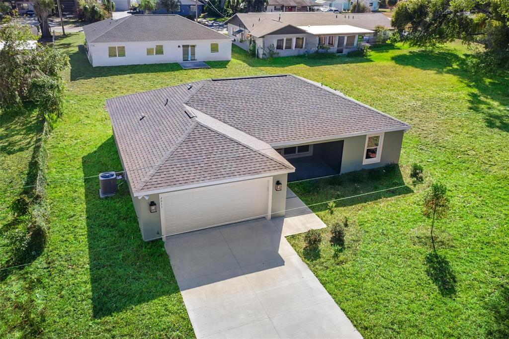 2011 Edgewood Avenue Leesburg, FL 34748 - Photo 39 of 44 a aerial view of a house with a yard