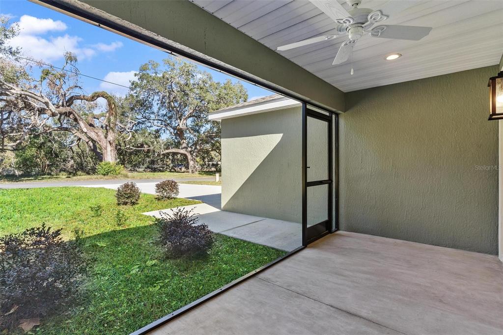2011 Edgewood Avenue Leesburg, FL 34748 - Photo 4 of 44 a view of a porch with a yard