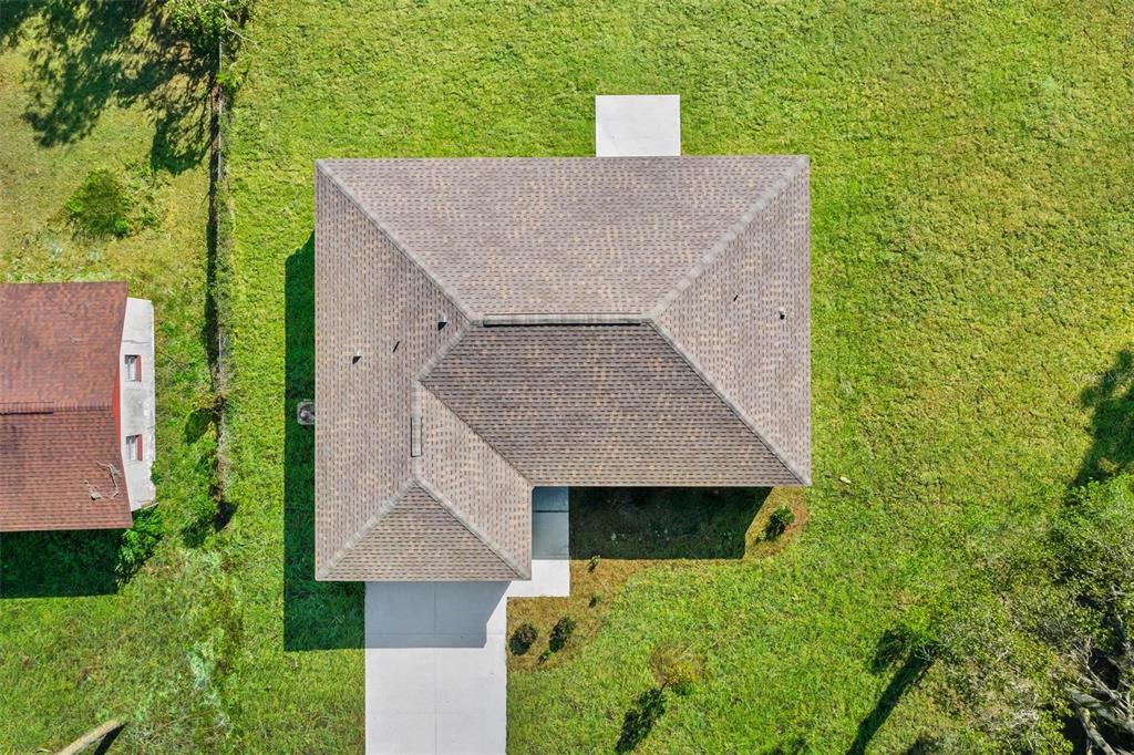 2011 Edgewood Avenue Leesburg, FL 34748 - Photo 44 of 44 an aerial view of a house with a yard