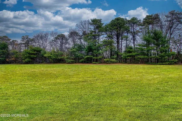 a view of a swimming pool and outdoor space