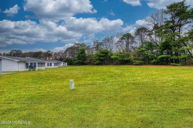 a view of a swimming pool with an ocean view