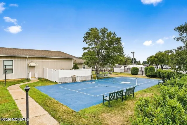 a view of swimming pool with patio