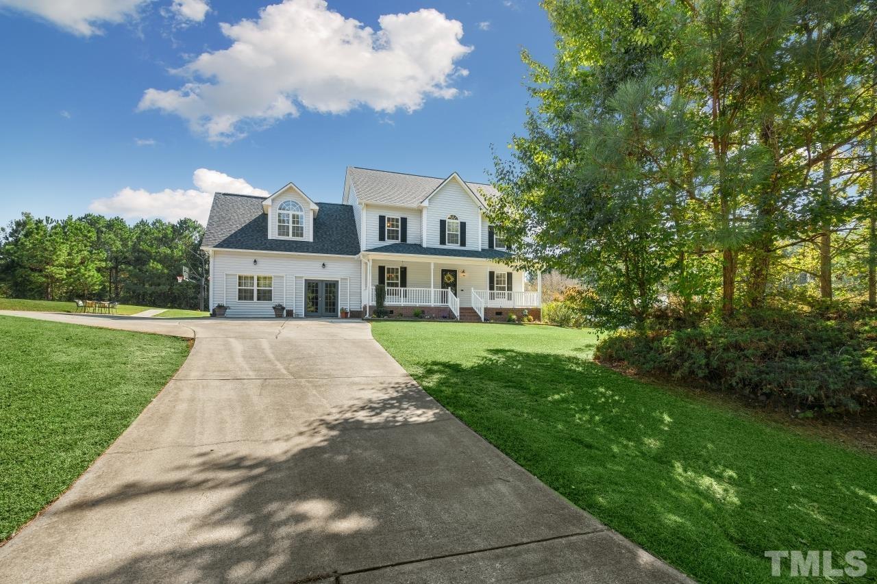 704 Rudy Drive Clayton, NC 27520 - Photo 2 of 30 a front view of a house with a yard