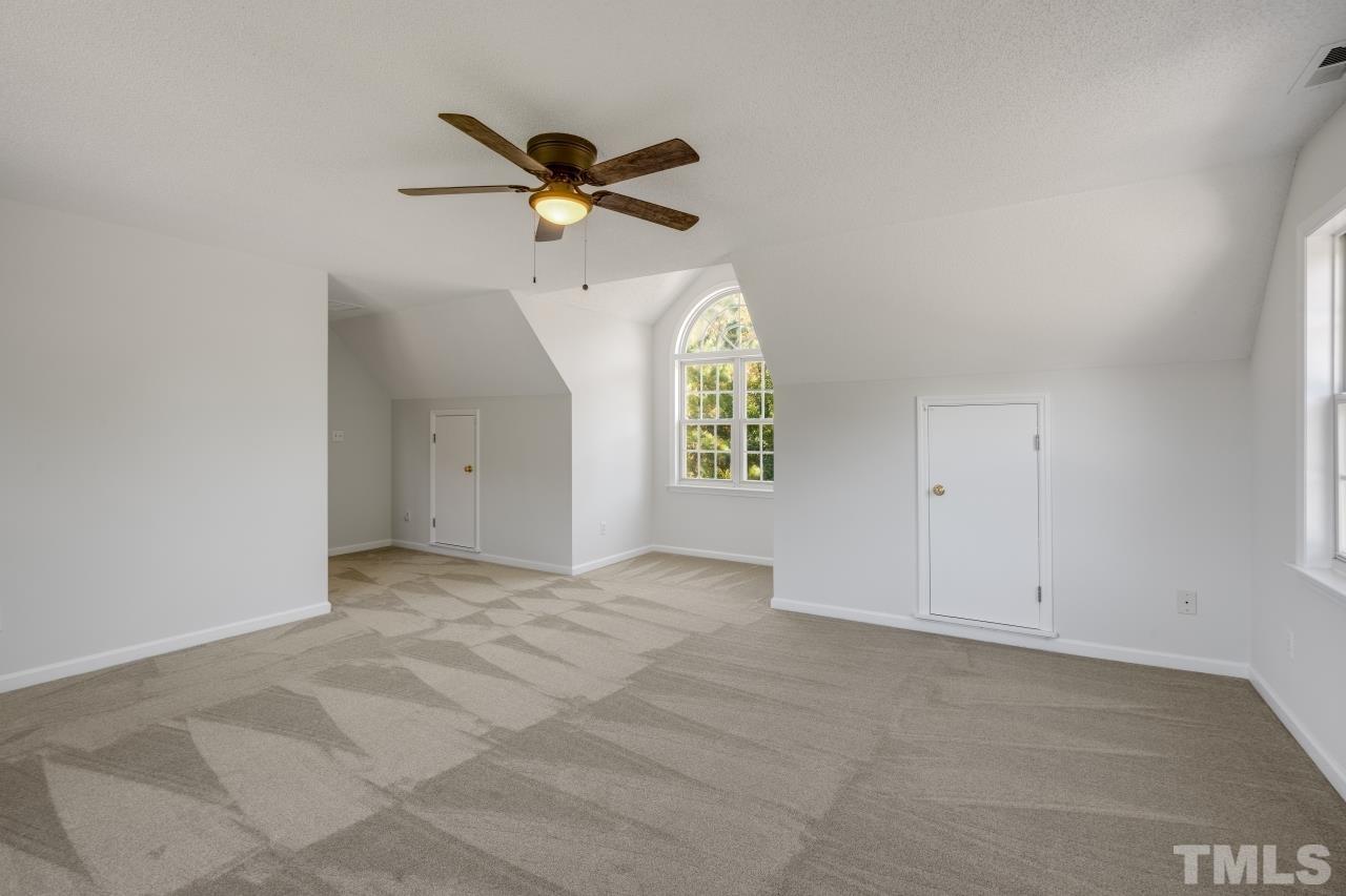 704 Rudy Drive Clayton, NC 27520 - Photo 20 of 30 a view of an empty room and window