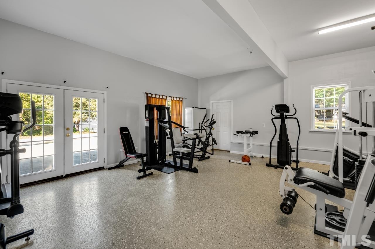 704 Rudy Drive Clayton, NC 27520 - Photo 23 of 30 a view of a room with gym equipment