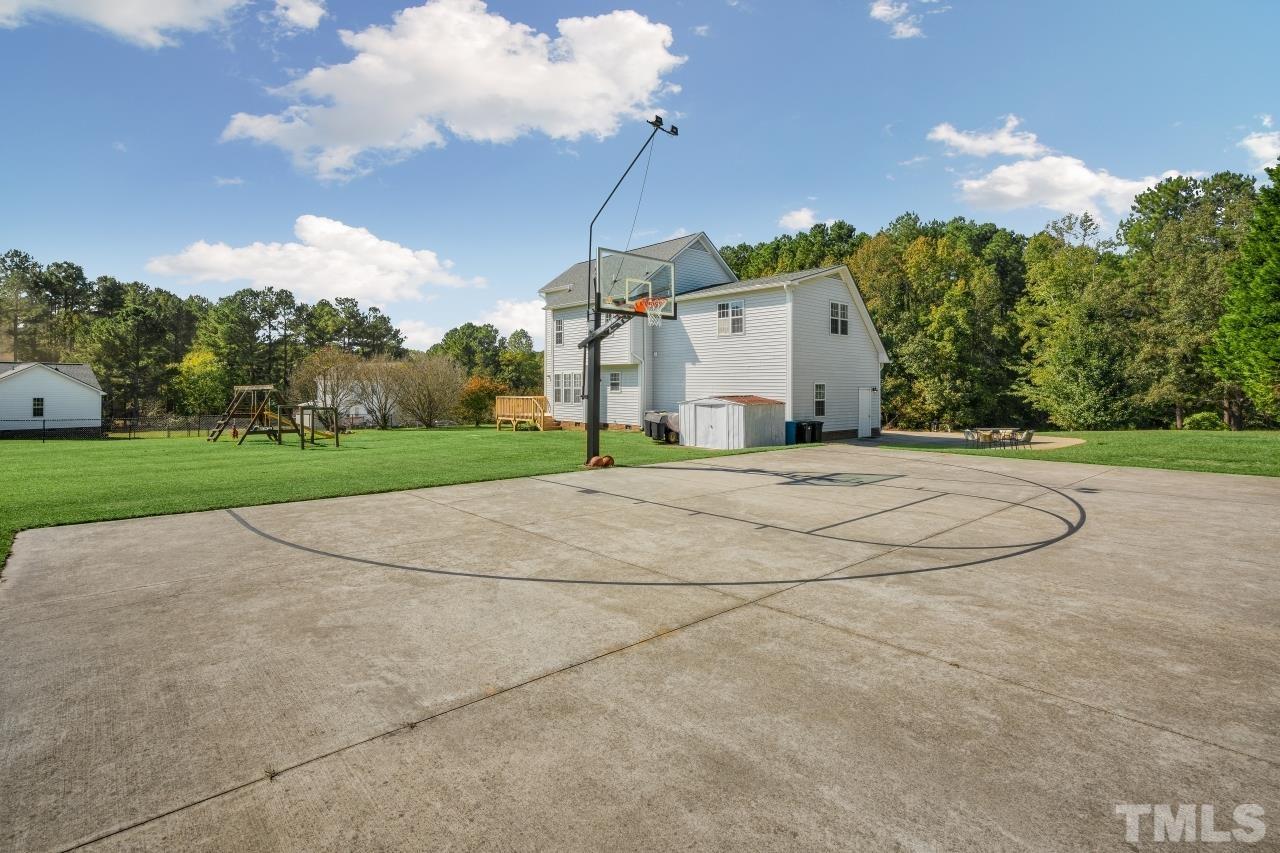 704 Rudy Drive Clayton, NC 27520 - Photo 27 of 30 a view of a house with a yard