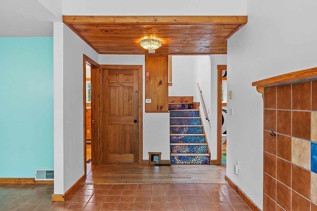 444 Old Dana Road Barre, MA 01005 - Photo 22 of 39 a view of a house with a door and wooden door