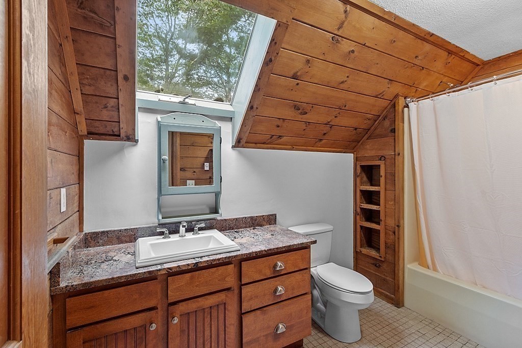 444 Old Dana Road Barre, MA 01005 - Photo 26 of 39 a bathroom with a granite countertop sink toilet and shower