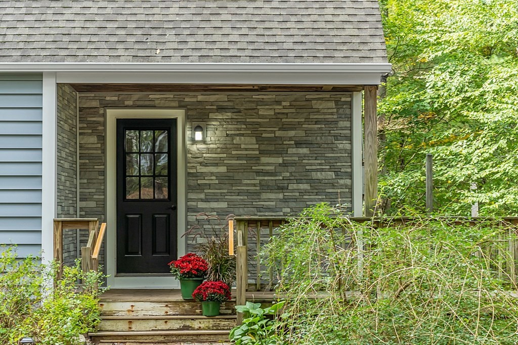 444 Old Dana Road Barre, MA 01005 - Photo 3 of 39 a front view of a house with plants