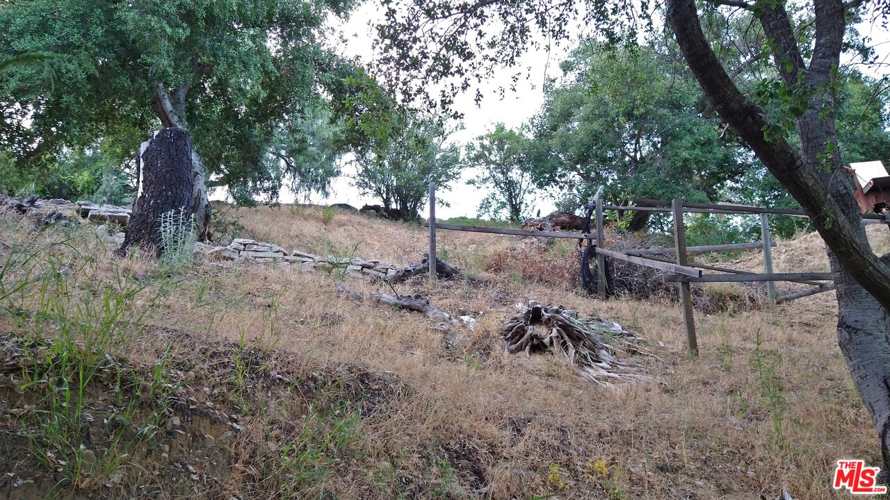 21190 Summit Road Topanga, CA 90290 - Photo 9 of 17 a view of backyard with green space and seating