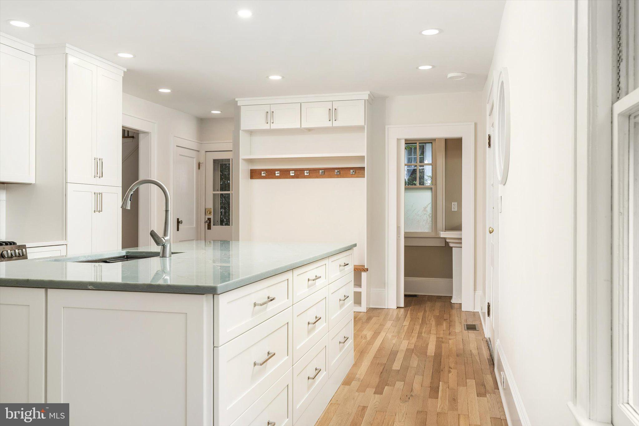 2148 Pennington Road Ewing, NJ 08638 - Photo 14 of 30 a kitchen with granite countertop a sink stainless steel appliances and cabinets
