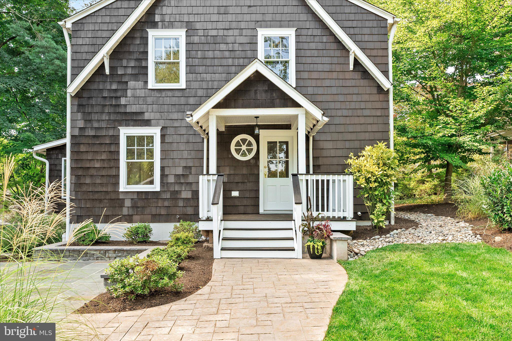 2148 Pennington Road Ewing, NJ 08638 - Photo 28 of 30 a front view of a house with garden