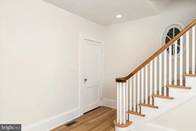 a view of entryway with wooden floor