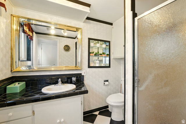 1188 600 East Logan, UT 84341 - Photo 13 of 16 Full bathroom featuring tile patterned floors, vanity, and a stall shower