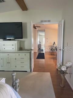 42 Seminole Path Wildwood, FL 34785 - Photo 13 of 59 a living room with furniture and a flat screen tv