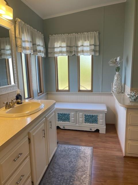42 Seminole Path Wildwood, FL 34785 - Photo 18 of 59 a bathroom with a double vanity sink mirror and double
