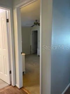 a kitchen with stainless steel appliances granite countertop a refrigerator and a stove