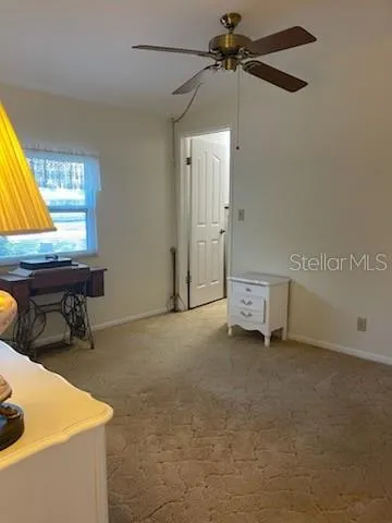 a lobby with furniture and window