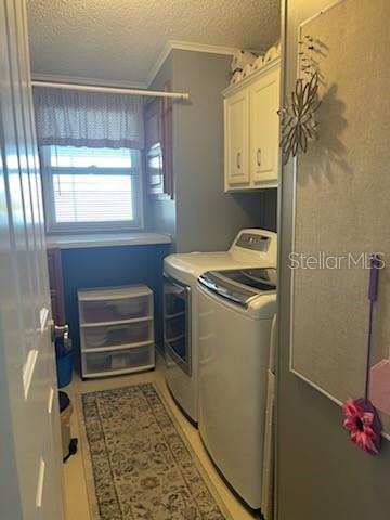 42 Seminole Path Wildwood, FL 34785 - Photo 27 of 59 a utility room with dryer and washer