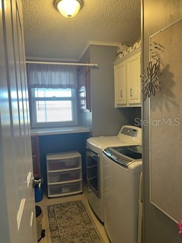 42 Seminole Path Wildwood, FL 34785 - Photo 28 of 59 a utility room with a sink a washer and dryer