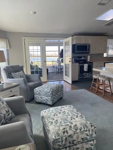 a living room with furniture and window