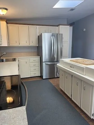 a view of a room with wooden floor and walls