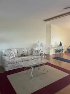 a view of storage and utility room with windows