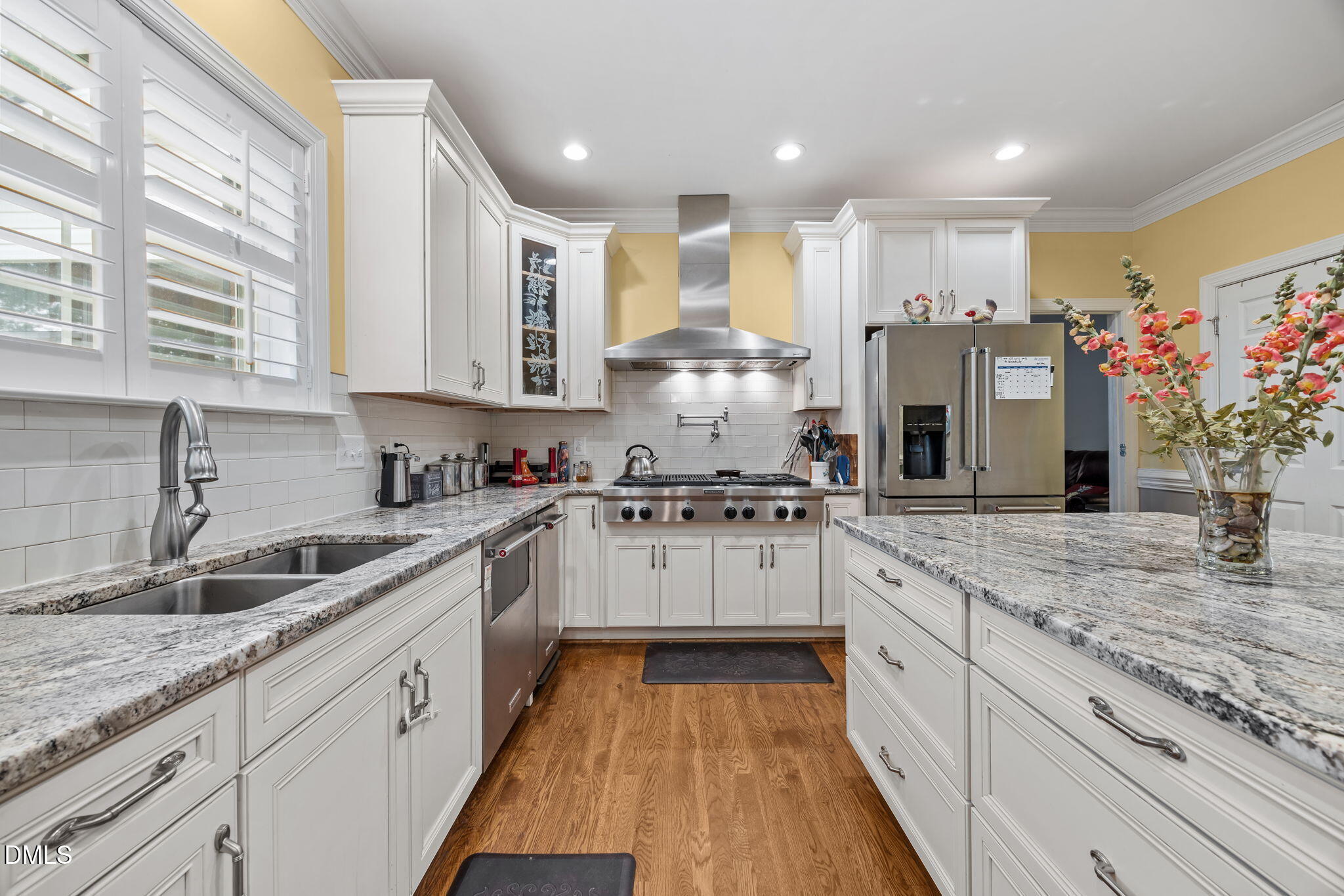2880 Elevation Road Four Oaks, NC 27524 - Photo 21 of 51 a kitchen with stainless steel appliances granite countertop a sink and cabinets
