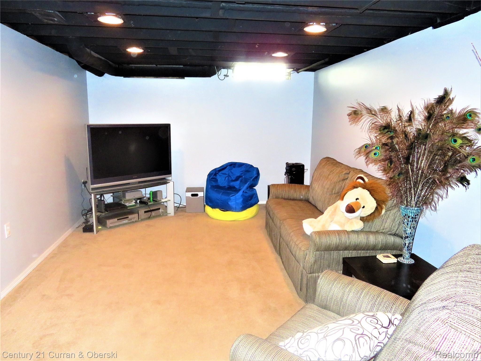 7770 Provincial Road Canton, MI 48187 - Photo 21 of 26 Partially finished basement with carpet