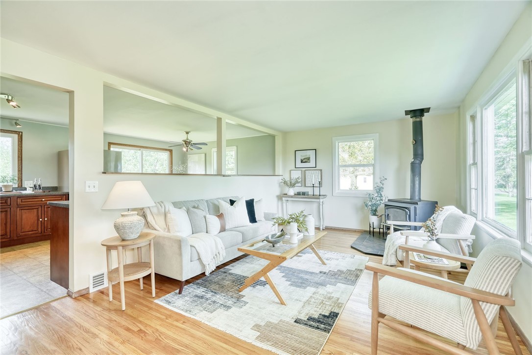 1815 Woodard Road Webster, NY 14580 - Photo 7 of 45 OPEN CONCEPT - LIVING ROOM with GORGEOUS HARDWOODS