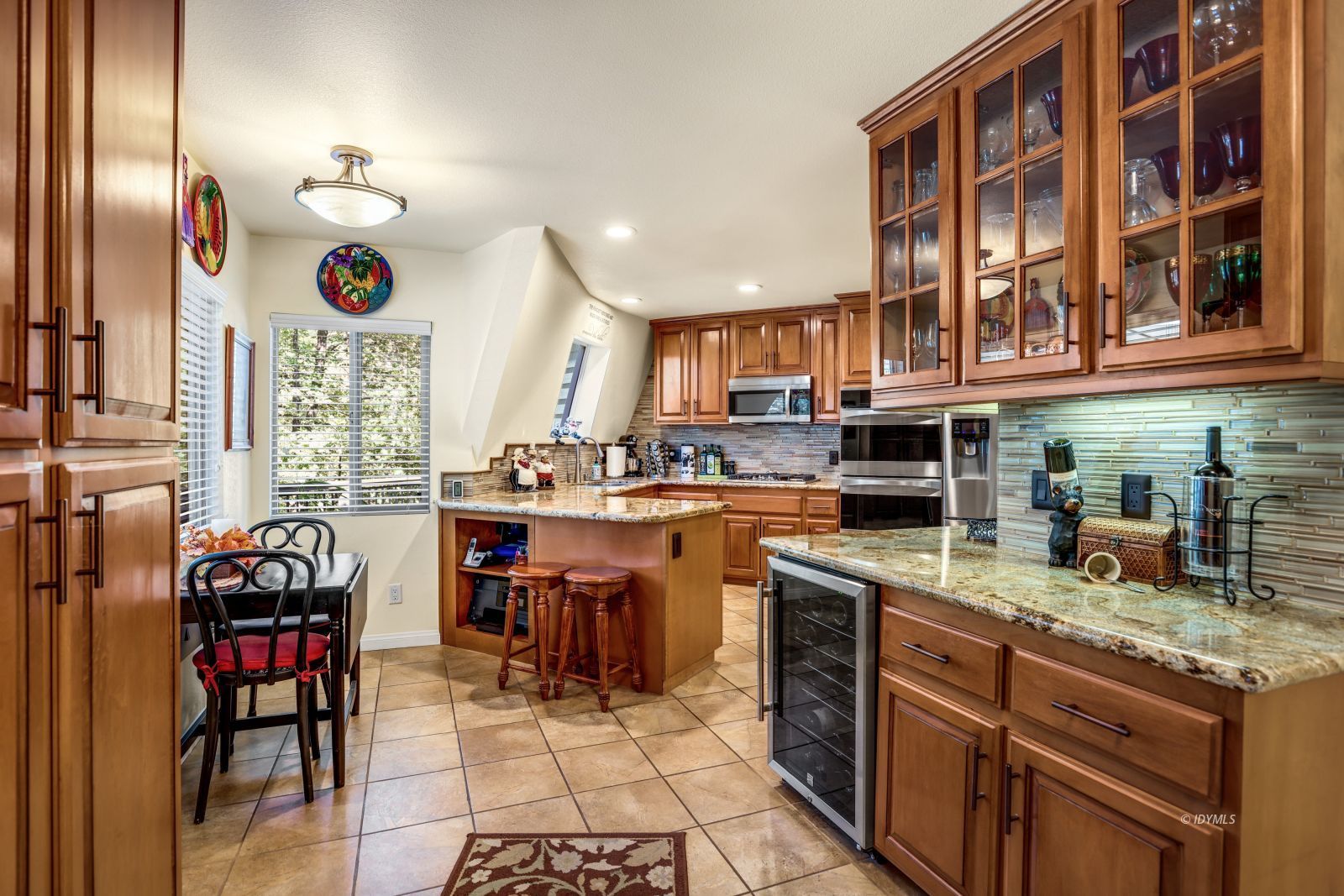 53599 West Ridge Road Idyllwild, CA 92549 - Photo 17 of 49 a kitchen with a sink cabinets and window